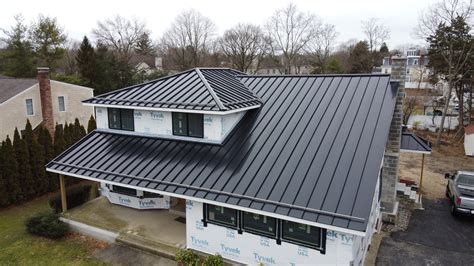 black metal roof on house|black matte standing seam metal.